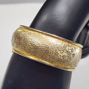 Kramer Wide Gold Tone Floral Pattern Bangle Cuff Clamper Bracelet 1970s Vintage